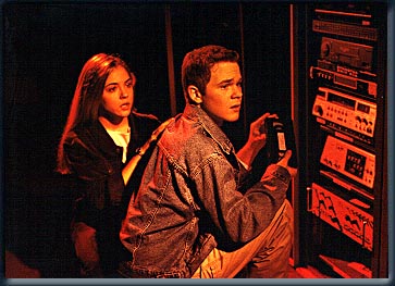 Rachel and Jake  stealing a tape of Marco morphing from a T.V. station.